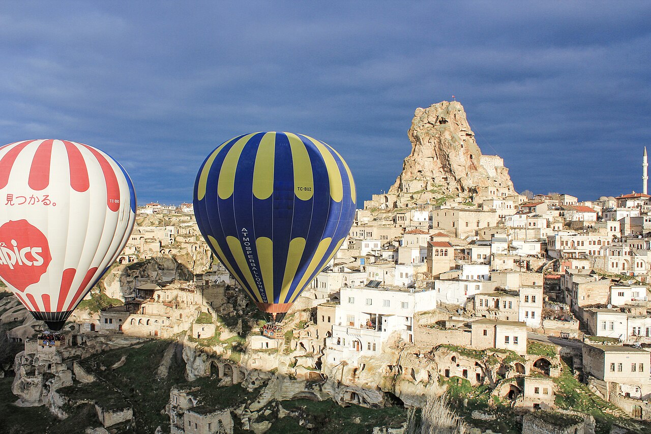 Cappadocia at sunrise with hot air balloons
